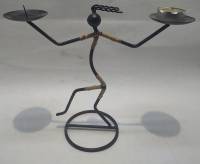 Подсвечник металлический девушка на 2 свечи (сост.на фото)