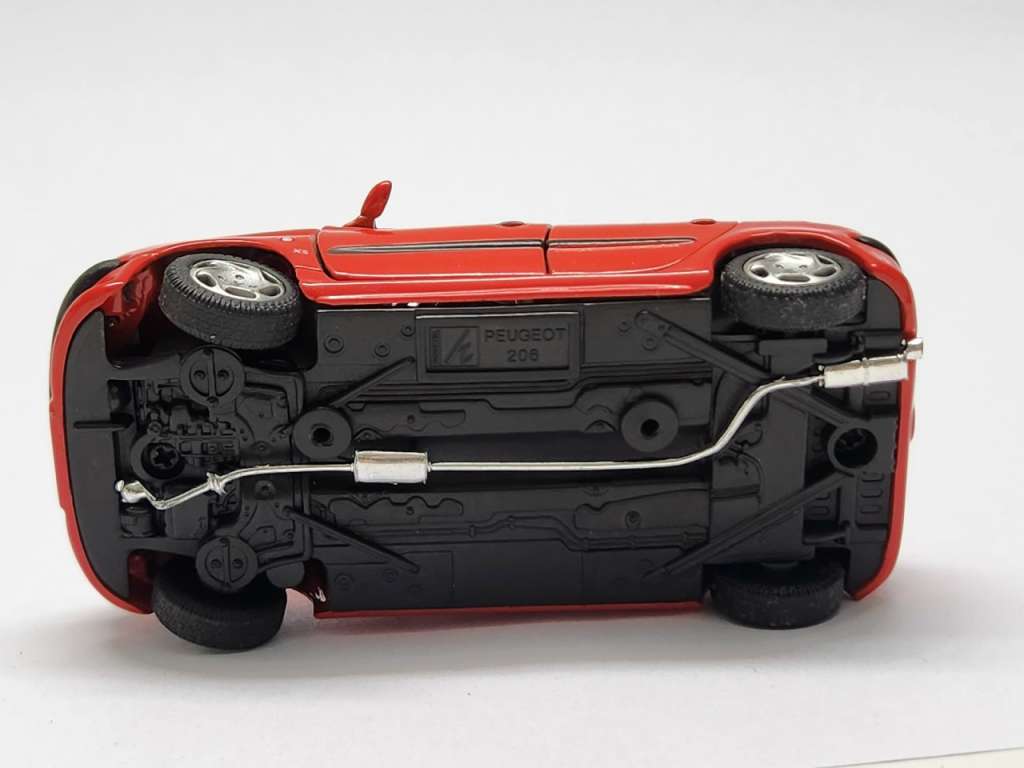 Модель авто 1:43 Peugeot 206 hongwell красный