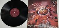 Пластинка виниловая , Orchester international Мелодия 300 мм. (Сост. отл.)