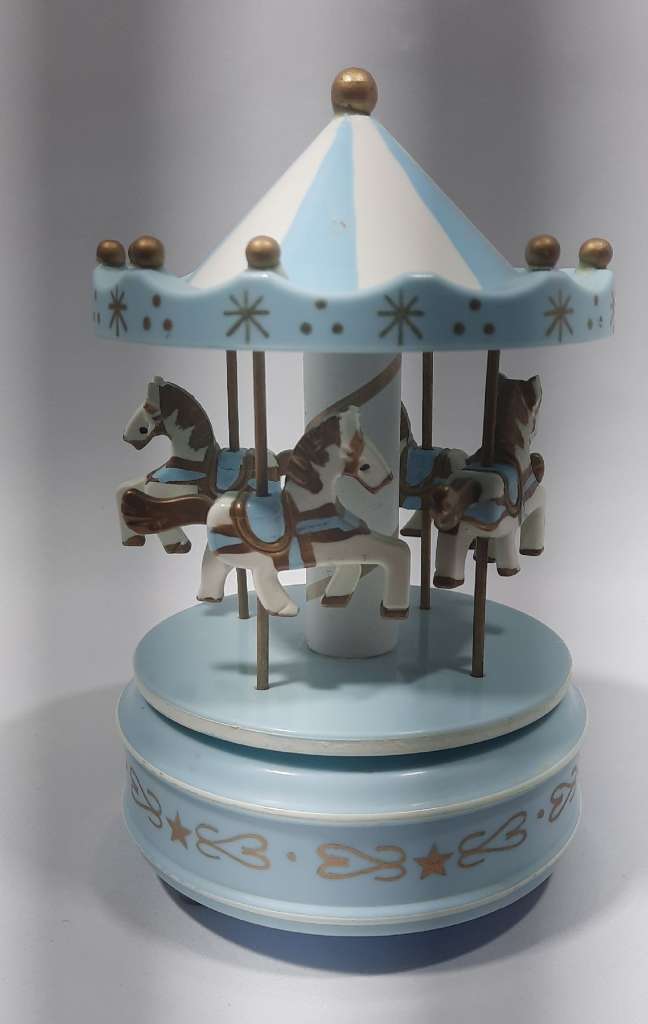 Игрушка музыкальная карусель лошадки (сост на. фото)