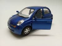 Модель авто 1:28 Nissan micra Kinsmart без коробки